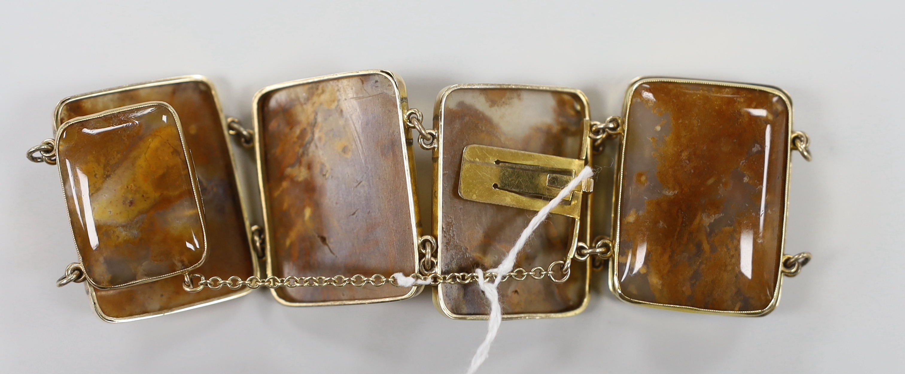 A late Victorian 9ct mounted six stone agate set bracelet, approx. 16cm, gross weight 49 grams.